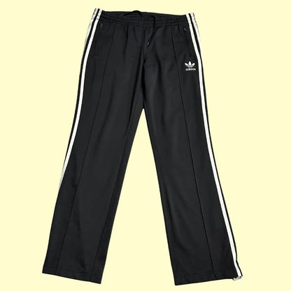 Adidas track pants offer a sleek and classic look