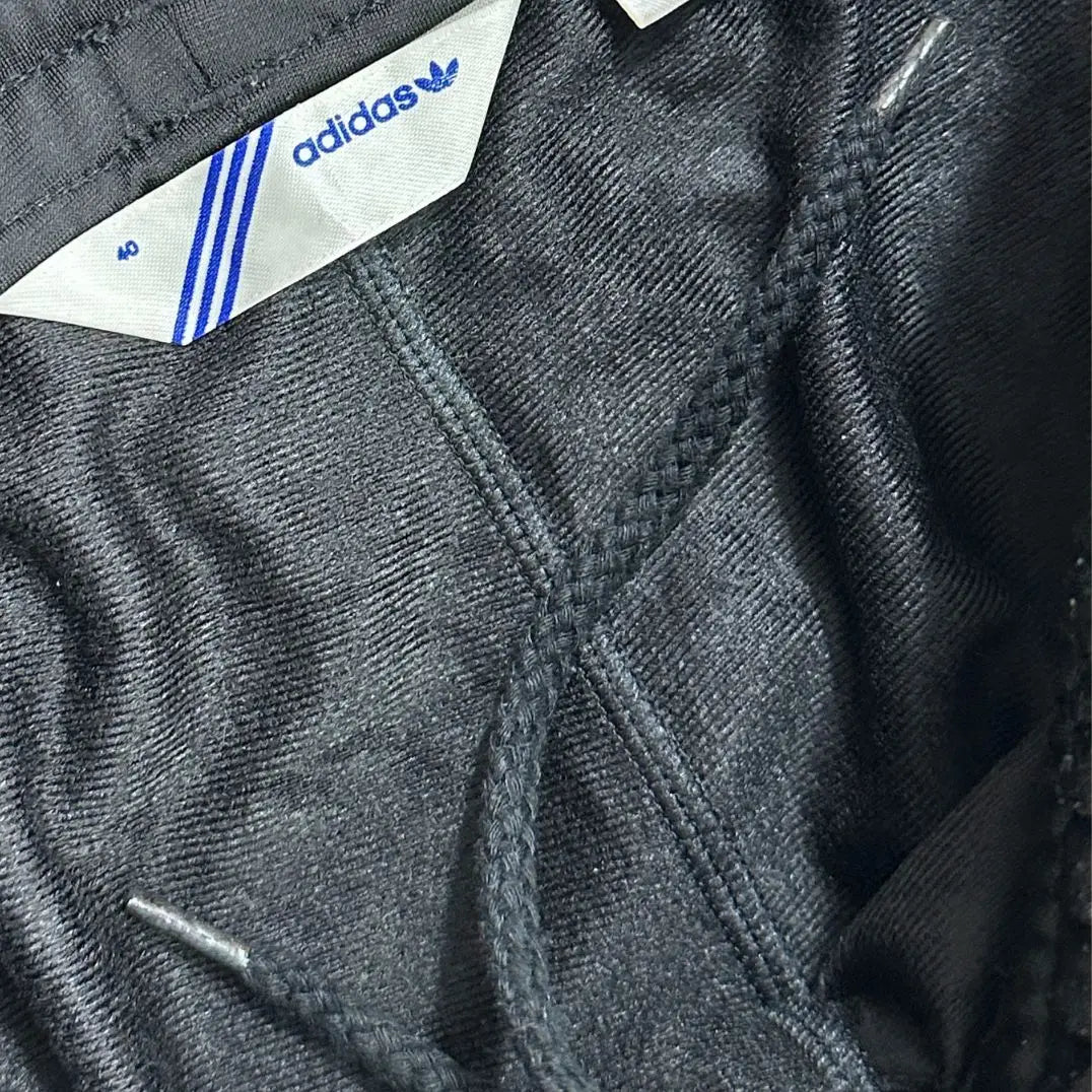 Adidas track pants offer a sleek and classic look