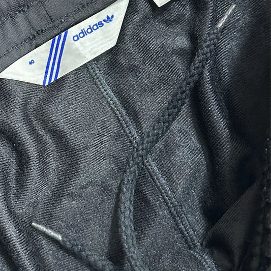 Adidas track pants offer a sleek and classic look