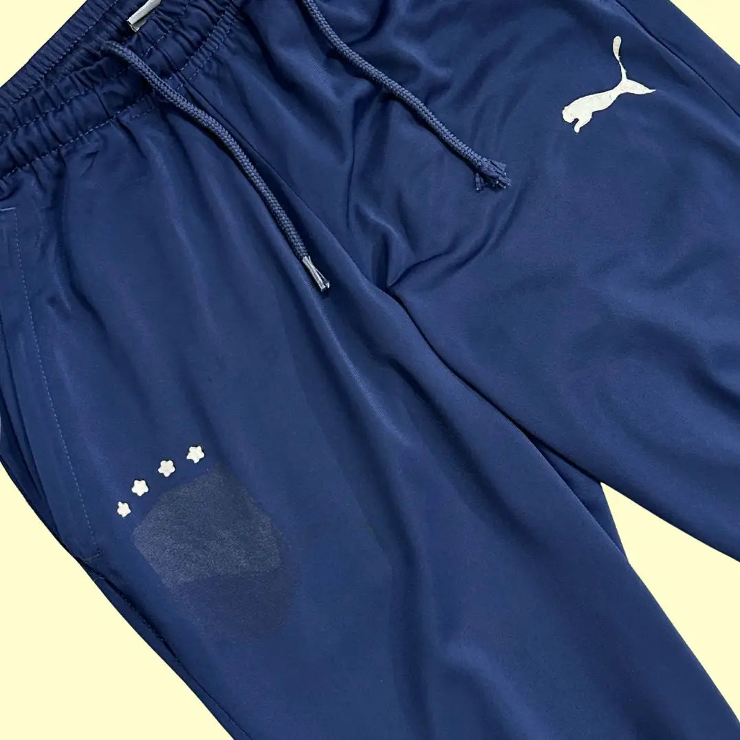 Puma navy track pants combine comfort and style