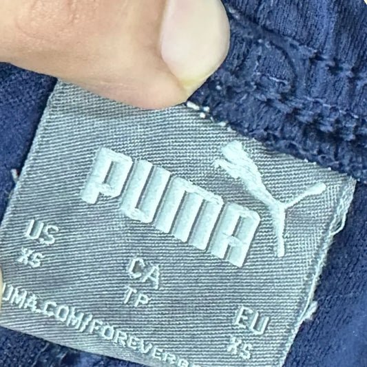 Puma navy track pants combine comfort and style