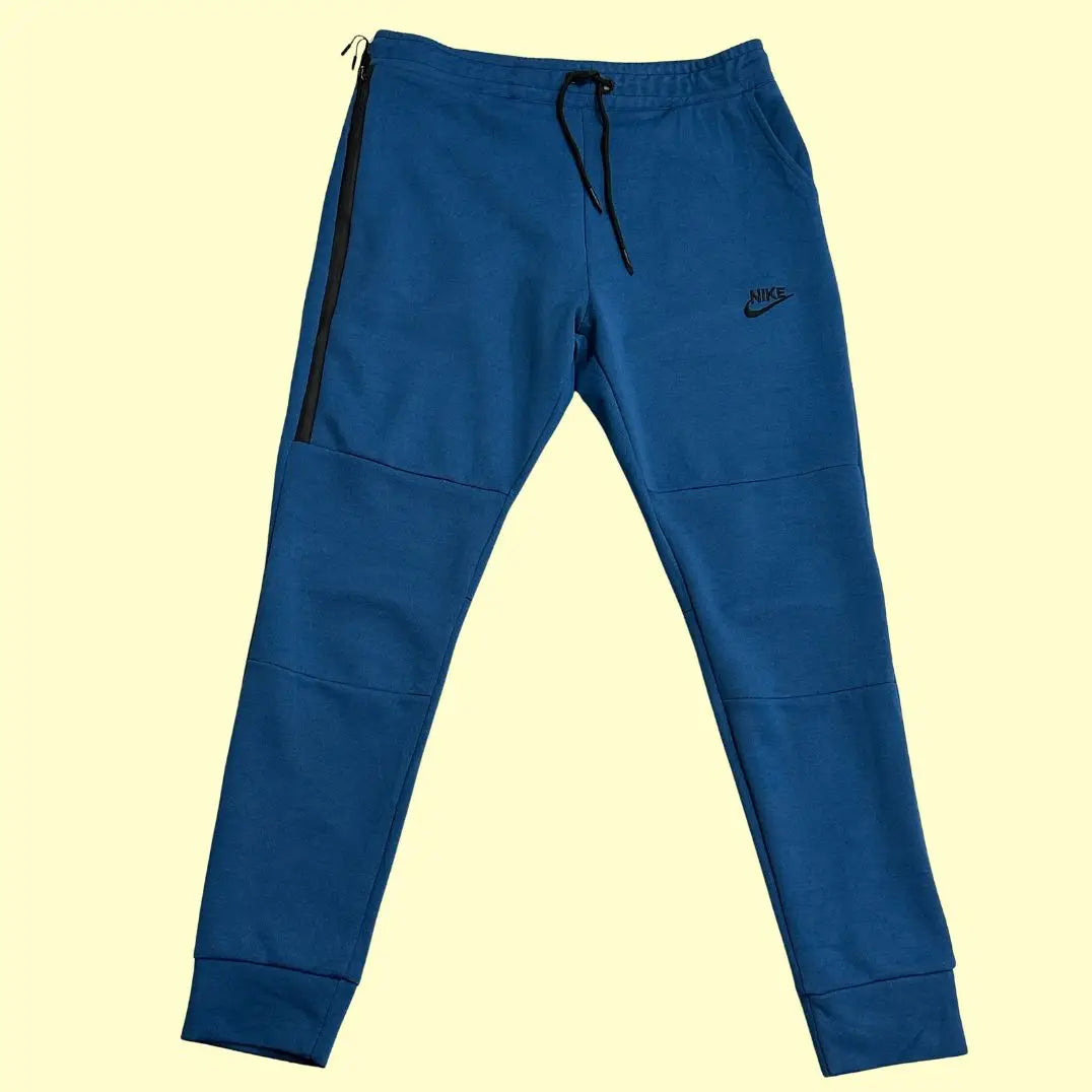 Nike blue track pants are perfect for both athletic wear and casual outings.