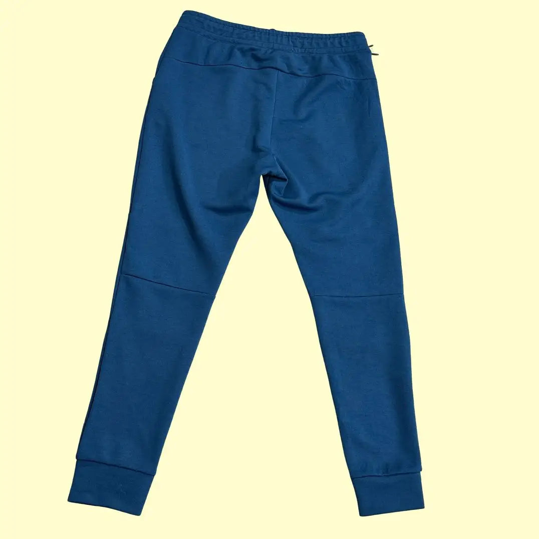 Nike blue track pants are perfect for both athletic wear and casual outings.