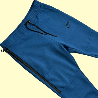 Nike blue track pants are perfect for both athletic wear and casual outings.