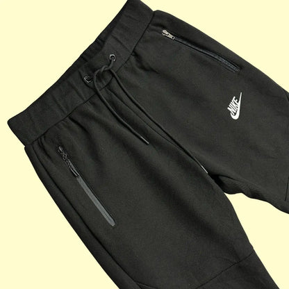 black Nike track pants are a perfect combination of style, comfort, and performance