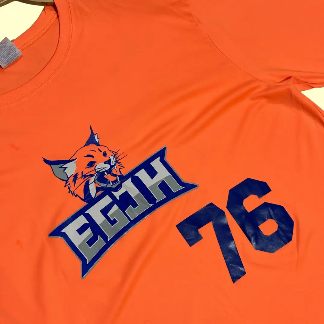 Port & Company Performance T-shirt in bright orange, size XL.