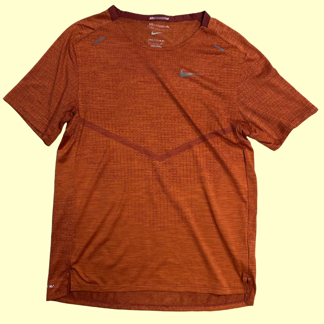 Nike Running Dri-FIT ADV t-shirt in burnt orange.