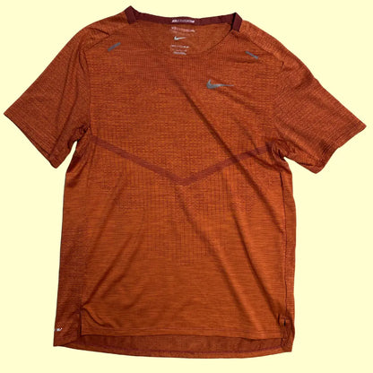 Nike Running Dri-FIT ADV t-shirt in burnt orange.