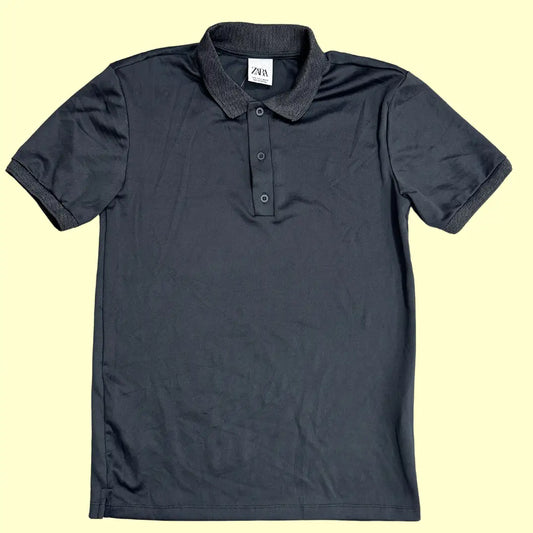 Classic black polo shirt from Zara, made in Portugal.