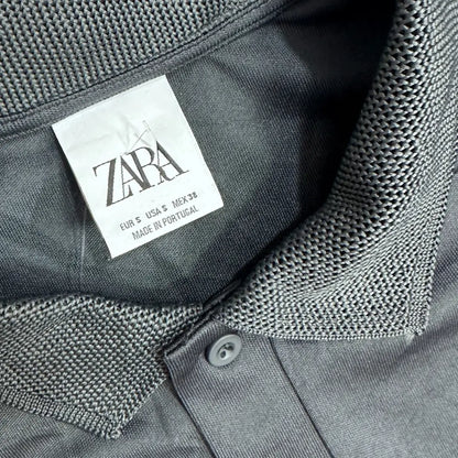 Classic black polo shirt from Zara, made in Portugal.