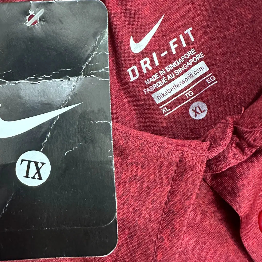 Nike Dri-Fit polo in maroon, designed for performance and comfort