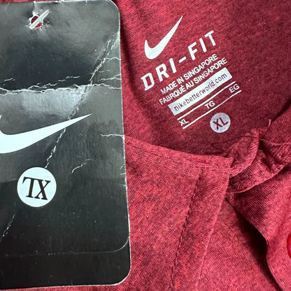 Nike Dri-Fit polo in maroon, designed for performance and comfort