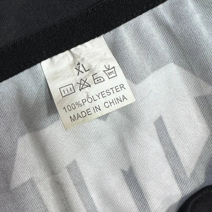 Tiger Muay Thai Training T-shirt in black with bold front tiger logo and Thai script.