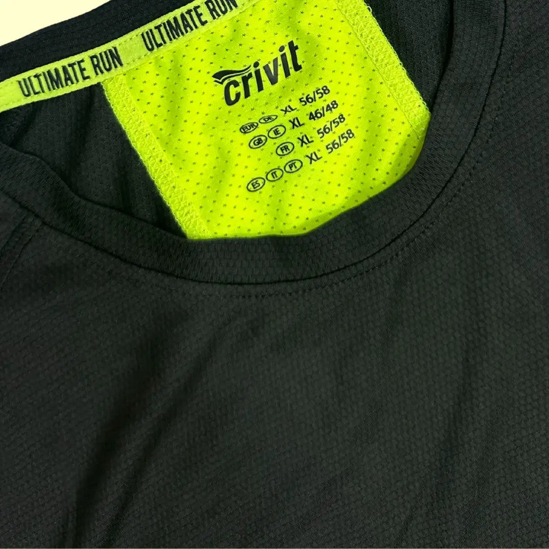 Crivit Ultimate Run Performance T-shirt in black with neon yellow mesh panels for ventilation