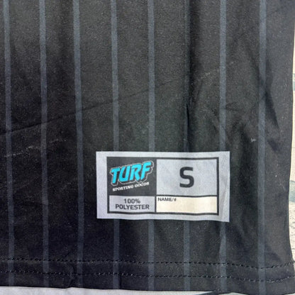 A stylish black jersey tee with a pinstripe design and bold red “Dirty Queens” lettering on the front