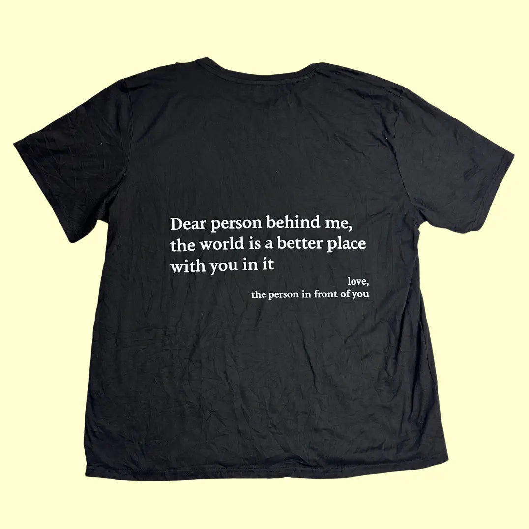 A meaningful and stylish black graphic tee with uplifting messages