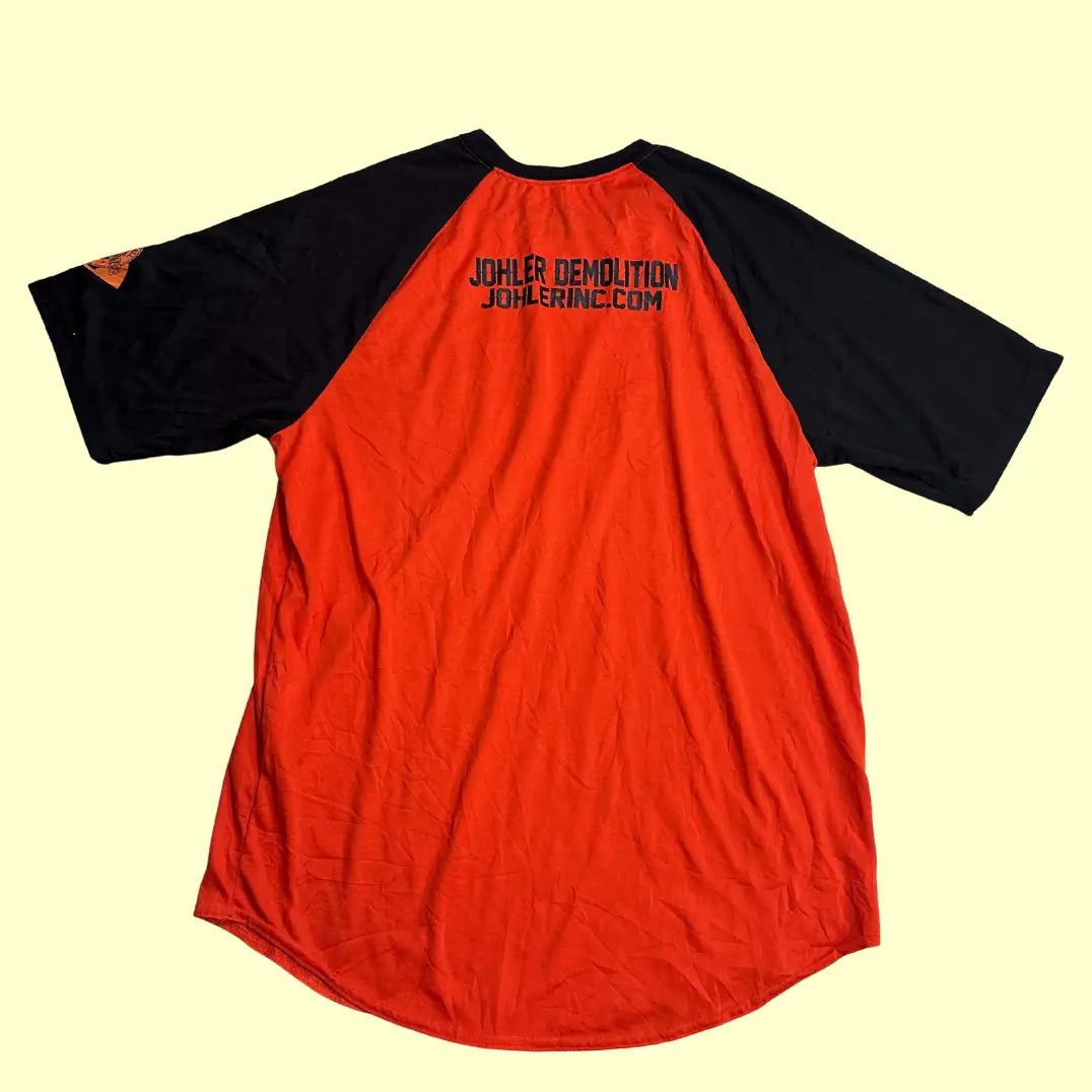 Two-tone Des Plaines Youth Baseball raglan jersey in bright orange with black sleeves.