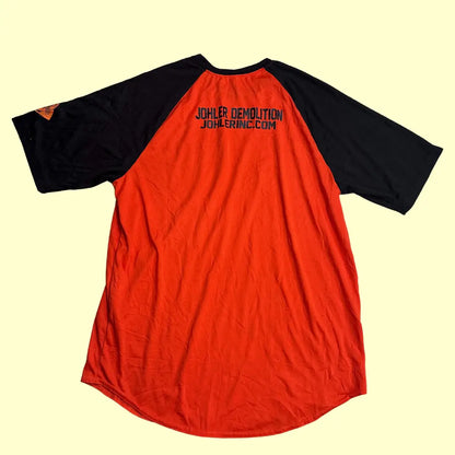 Two-tone Des Plaines Youth Baseball raglan jersey in bright orange with black sleeves.
