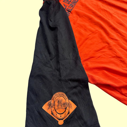 Two-tone Des Plaines Youth Baseball raglan jersey in bright orange with black sleeves.