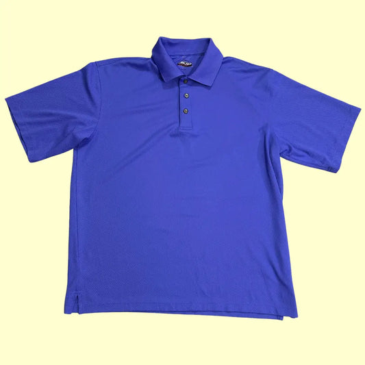 Kirkland Signature Performance Polo Shirt in royal blue.