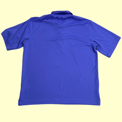 Kirkland Signature Performance Polo Shirt in royal blue.