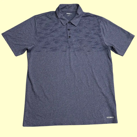 OGIO Performance Polo Shirt in dark heather grey with a subtle patterned design across the chest.