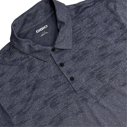 OGIO Performance Polo Shirt in dark heather grey with a subtle patterned design across the chest.