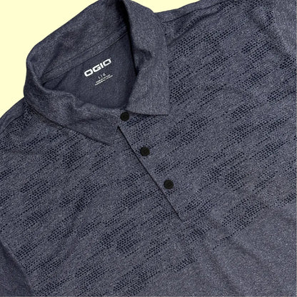 OGIO Performance Polo Shirt in dark heather grey with a subtle patterned design across the chest.