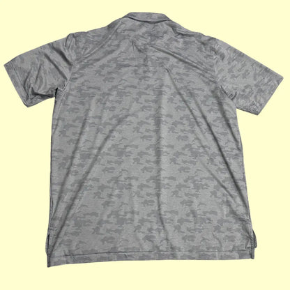 Peter Millar performance polo in grey camo pattern.