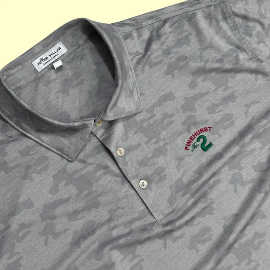 Peter Millar performance polo in grey camo pattern.