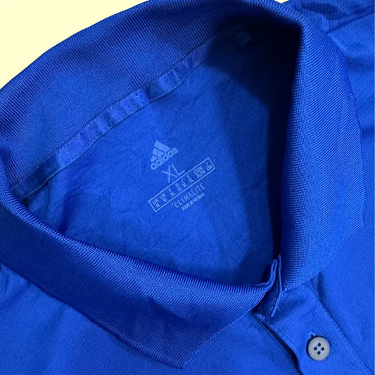 Adidas Climalite polo in bright royal blue.