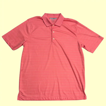 Greg Norman ML75 PlayDry Polo Shirt in coral pink with subtle stripe design.