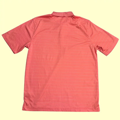 Greg Norman ML75 PlayDry Polo Shirt in coral pink with subtle stripe design.