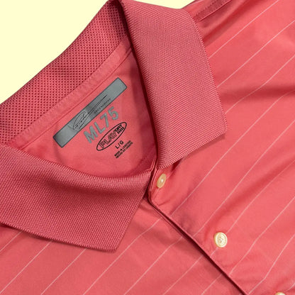 Greg Norman ML75 PlayDry Polo Shirt in coral pink with subtle stripe design.