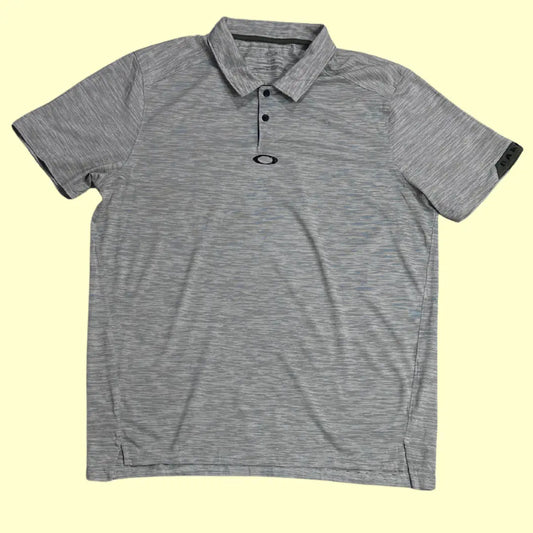 Oakley Performance Polo Shirt in light gray with subtle stripe design.