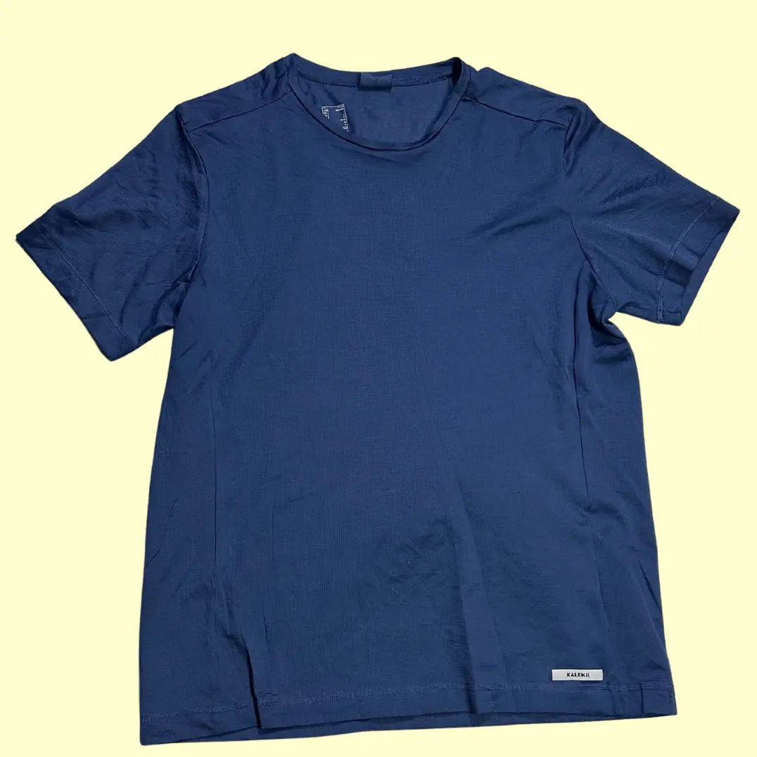 Solid navy blue Kalenji performance t-shirt made for running and active wear