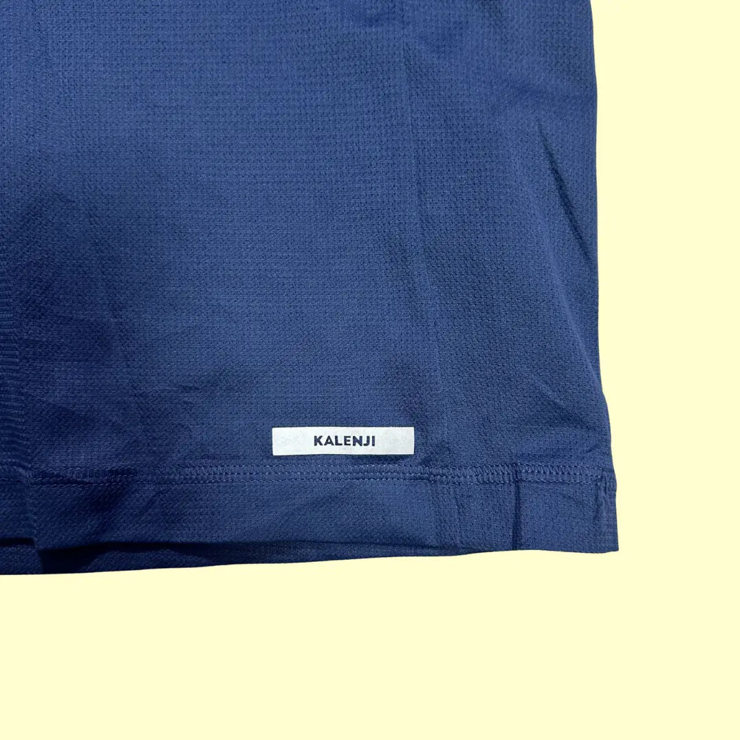 Solid navy blue Kalenji performance t-shirt made for running and active wear