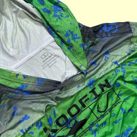 Koofin Gear performance hoodie in a vibrant green and blue pattern.