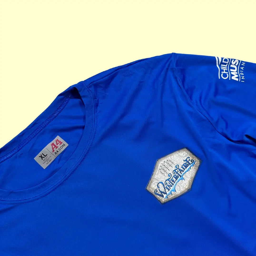 Vibrant blue A4 performance long-sleeve shirt featuring WinterFaire graphics