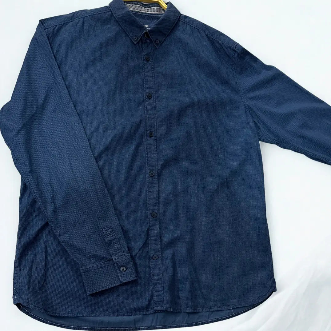 Tom Tailor ®. (dobby weave) that adds texture and depth to the design