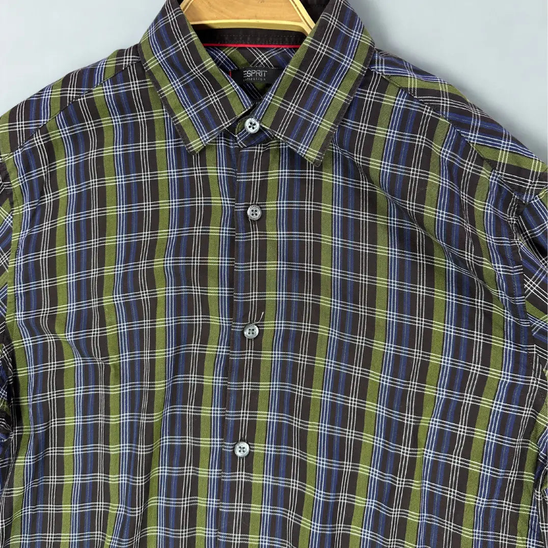 ESPRIT ®. It features a sophisticated plaid pattern with a modern color palette, combining shades of olive green, navy blue, and light blue on a dark background.