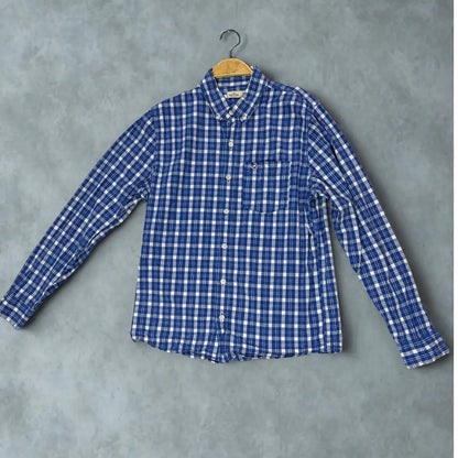Hollister ®. It features a timeless blue and white plaid pattern.