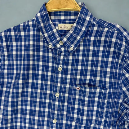 Hollister ®. It features a timeless blue and white plaid pattern.