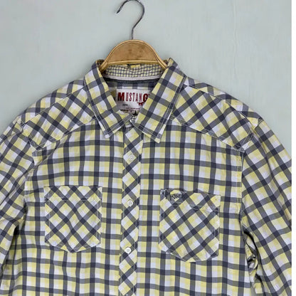 Mustang ® . A brand known for its denim and quality casual wear. It features a bold and attractive plaid pattern in a distinctive color combination of lemon yellow, charcoal grey, and white.