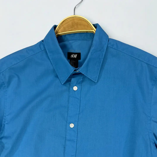 H&M ®. It comes in a striking and vibrant solid blue colour.