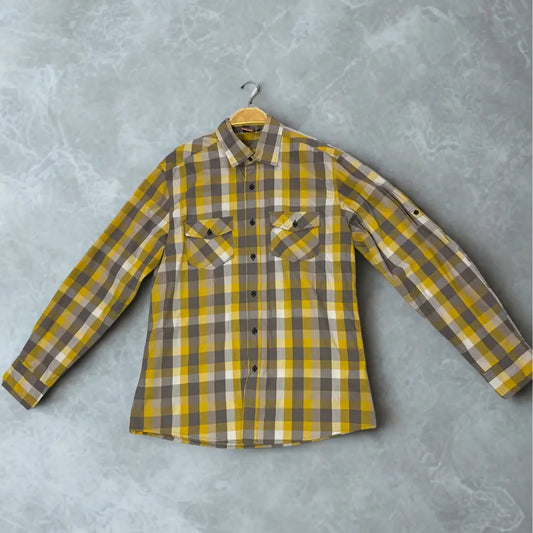ACTIVE ®. It features a bold and modern plaid pattern in a striking color combination of mustard yellow, grey, and white