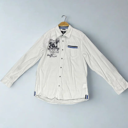 Tom Thompson ®. It comes in a crisp white and is designed to make a statement with its numerous graphic and decorative elements.