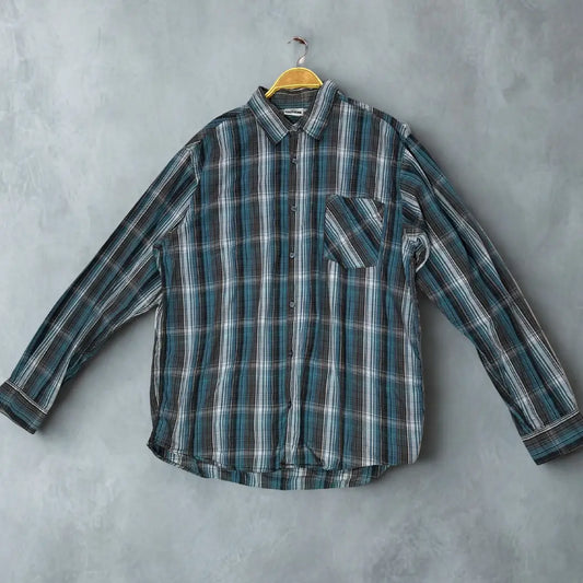 SOUTHERN ®. It features a handsome and versatile plaid pattern in a cool-toned color palette of teal, brown, black, and white.