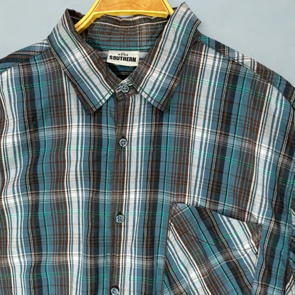 SOUTHERN ®. It features a handsome and versatile plaid pattern in a cool-toned color palette of teal, brown, black, and white.