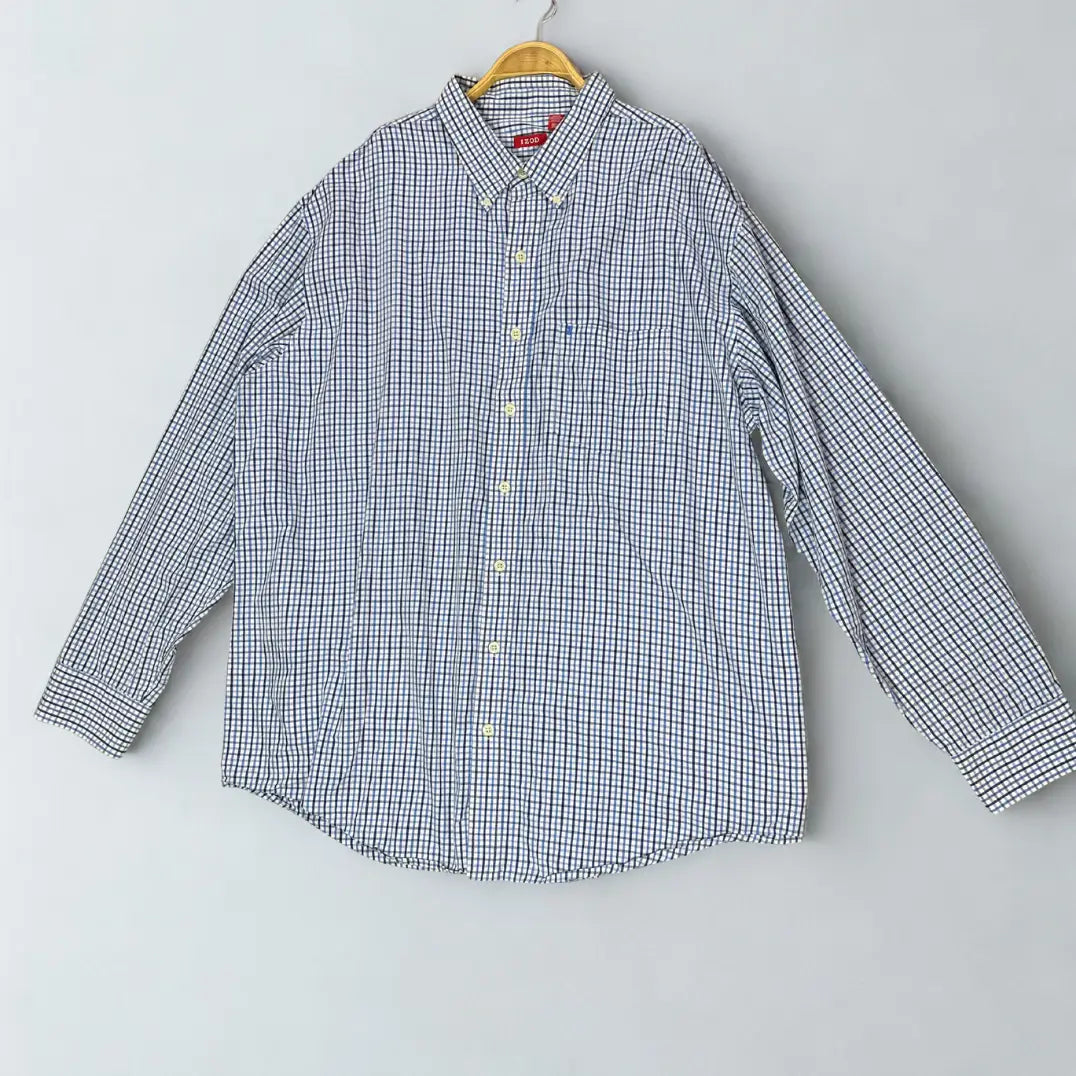 IZOD ®. It features a timeless and sharp graph check pattern, combining shades of blue and black on a crisp white background.